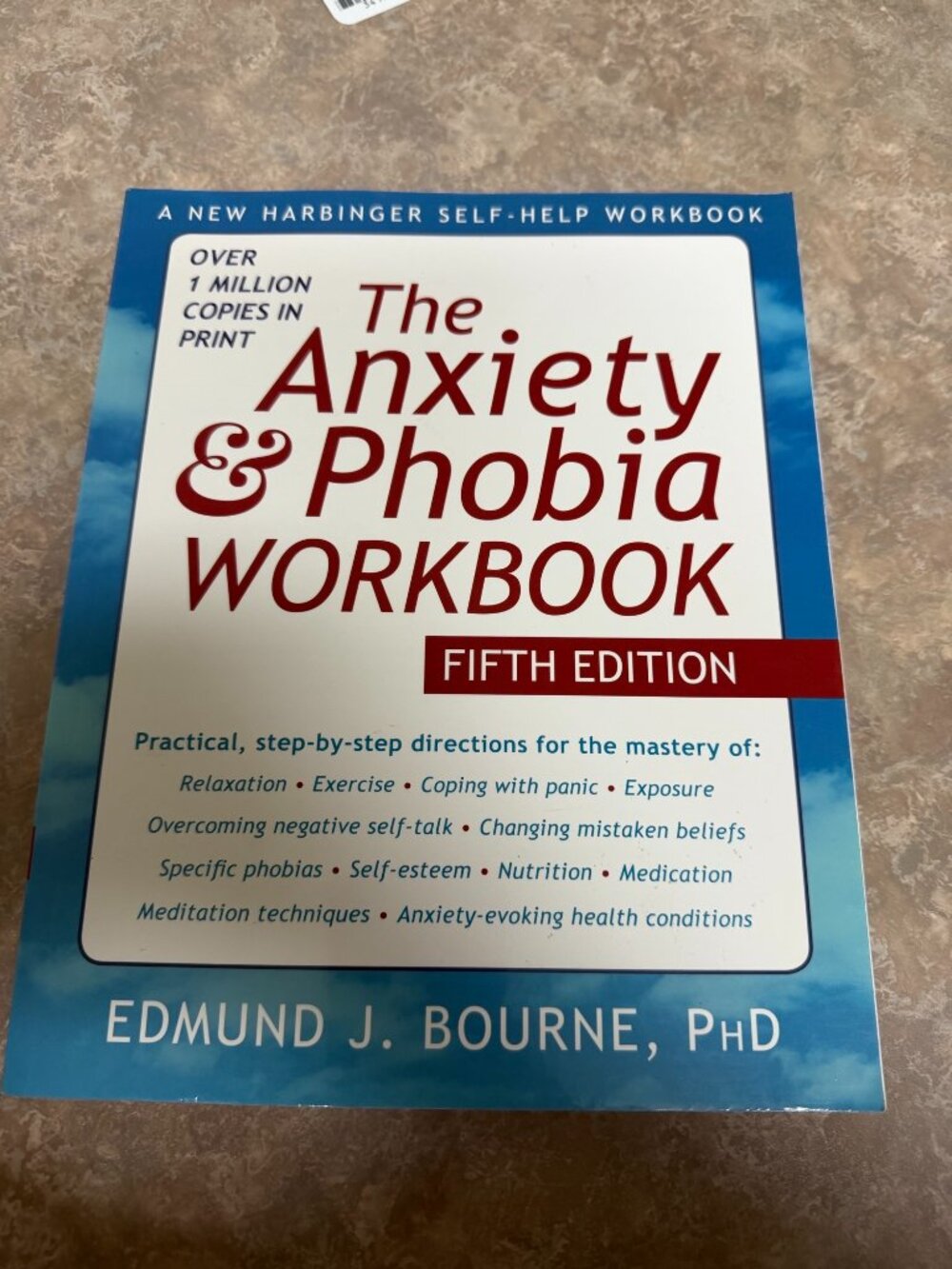 The Anxiety and Phobia Workbook, softcover, fifth edition- never used